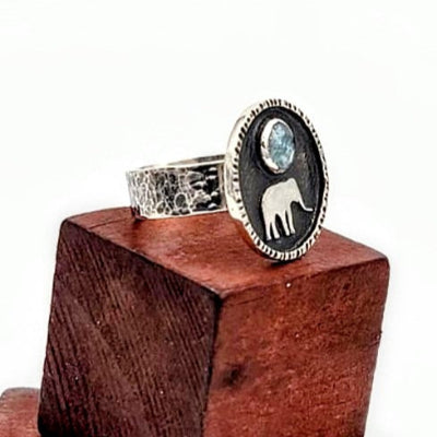Sterling Silver Aqua Kyanite Elephant Ring - Side View on Wooden Display Blocks