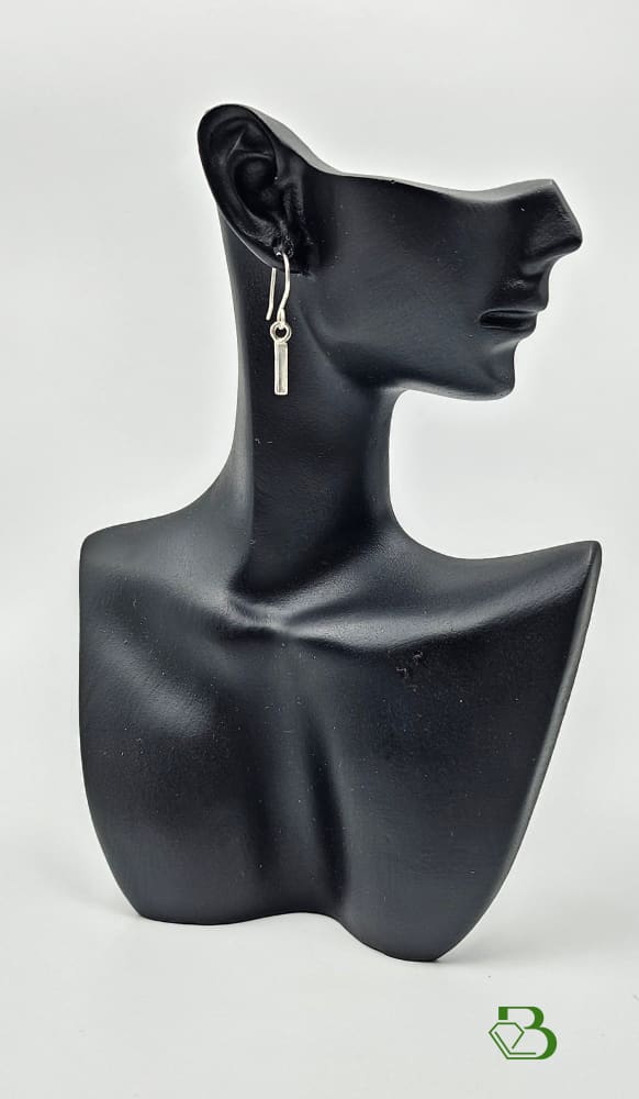 Sterling Silver Rectangular drop earrings on ceramic head
