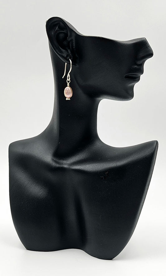 Handmade Sterling Silver Pink Freshwater Pearl earrings on ceramic head 