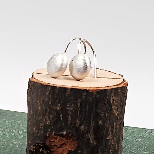 Handmade solid Sterling Silver Frosted Moon earrings side view