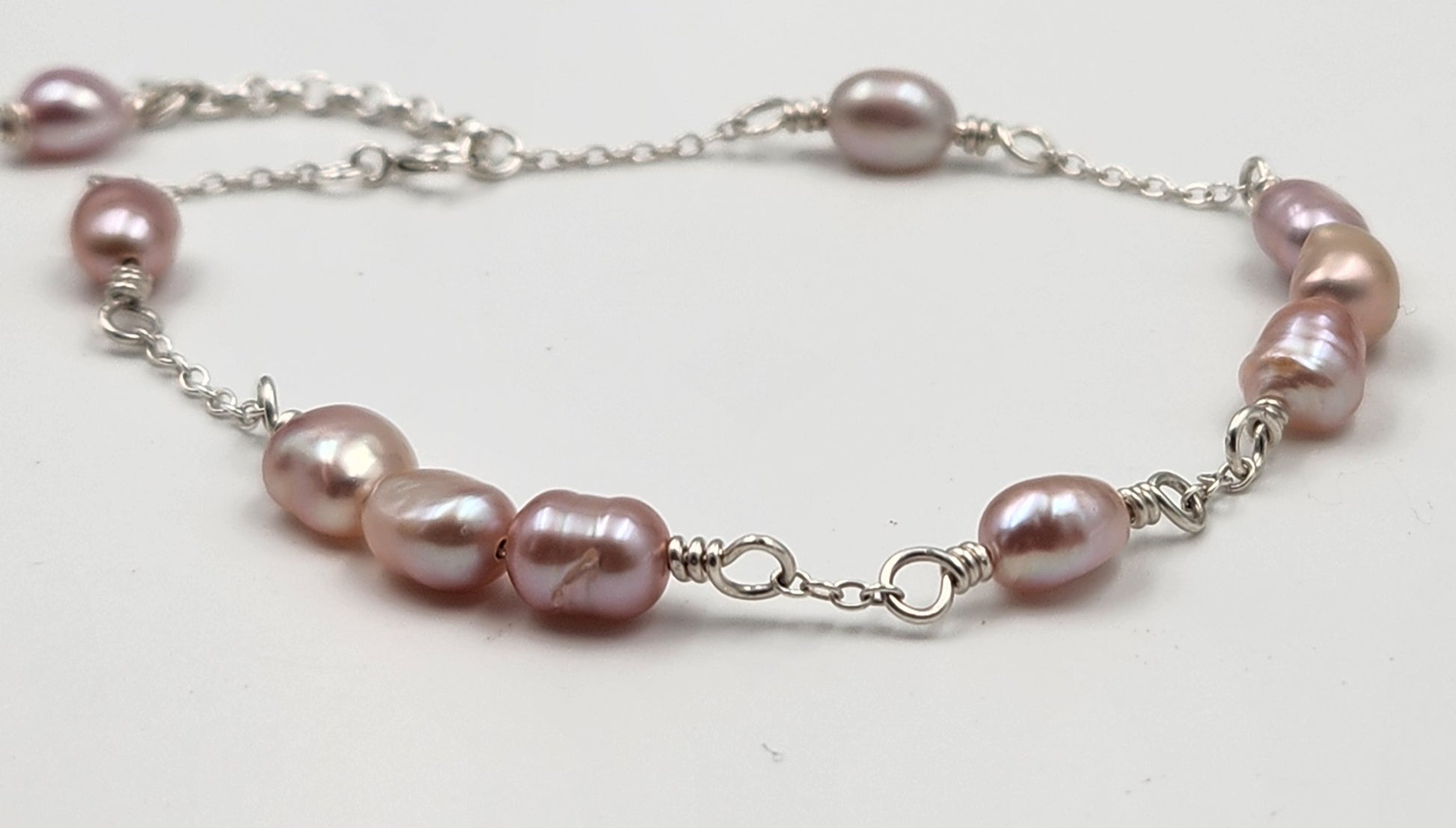 Pink Freshwater Pearl Close Up Image of Wire Wraps