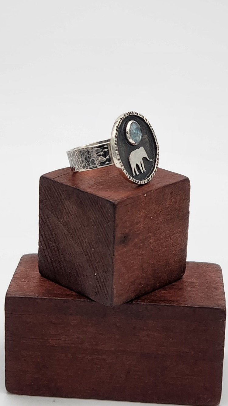 Sterling Silver Aqua Kyanite Elephant Ring - Side View on Wooden Display Blocks