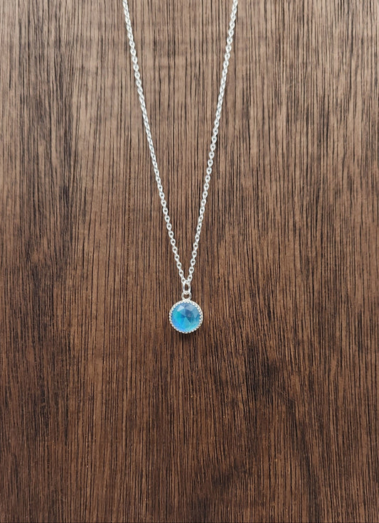 Sterling Silver Small Aura Opal Pendant on Wooden Display