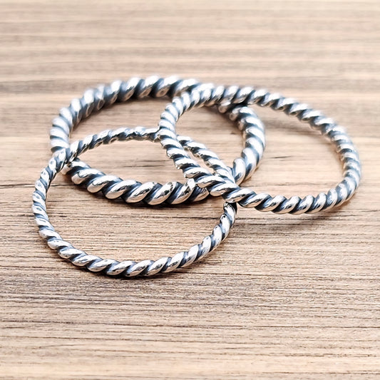 Three Handmade Sterling Silver Rope Rings together 