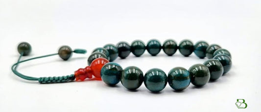 Tiger Iron and Red Agate Mala Bracelet on a white background