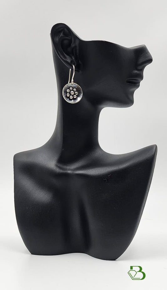 Sterling Silver Hammered disc daisy drops on ceramic head 
