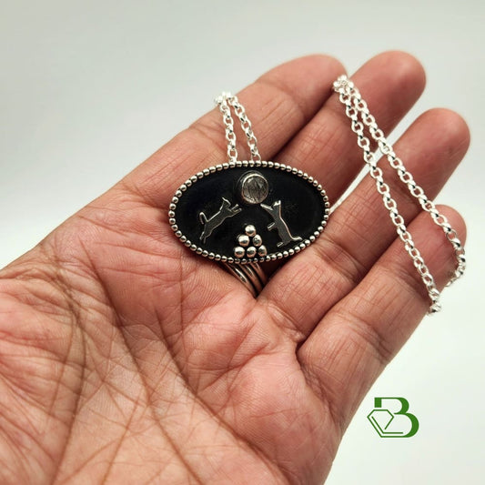 Sterling Silver Playful Cats Pendant With Black Rutilated Quartz - Hand View