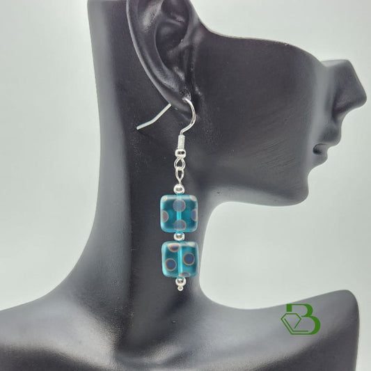 Sterling Silver Peacock Design Earrings on Display