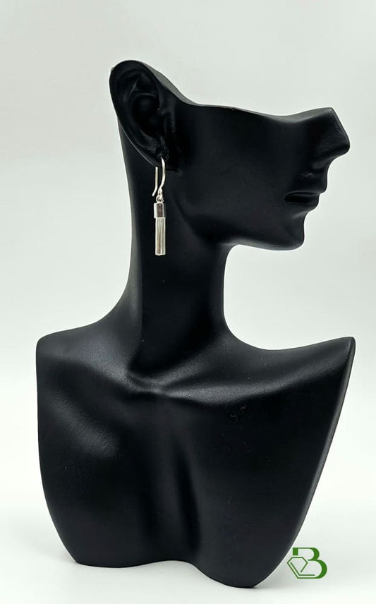 Sterling Silver Tassel earrings on s black ceramic head 